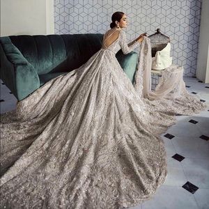 Very heavy walima dress.